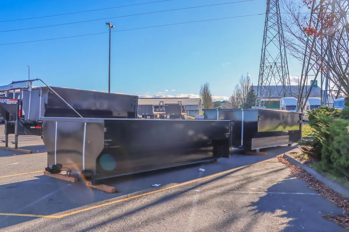 Roll-off dumpster ready for waste disposal at job site for 15 Yard Dumpster Rental in Grapevine